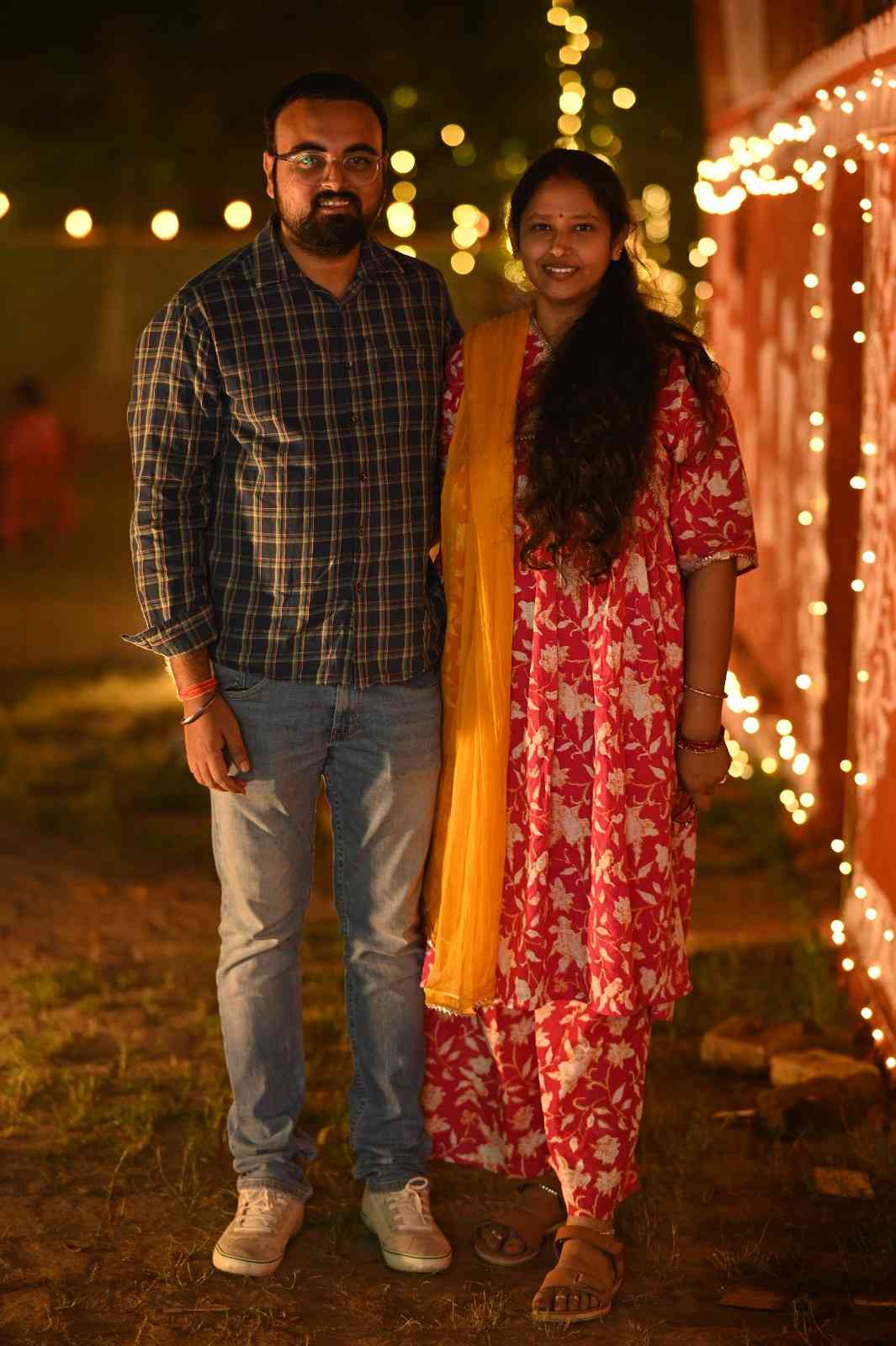A group of classical Indian musicians performing on stage.